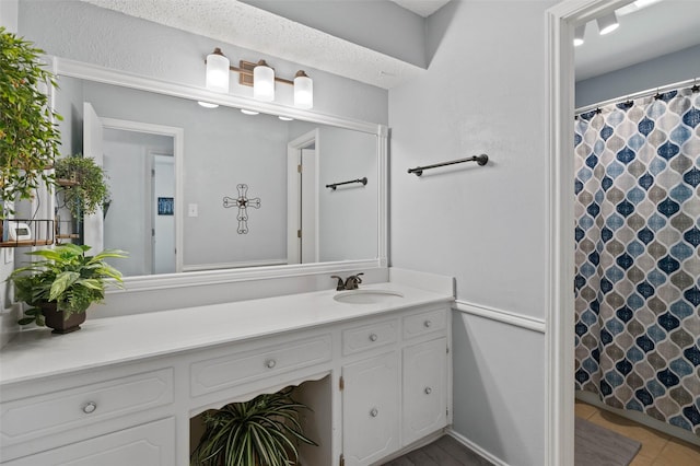 805 Sandpiper Dr, Denton, TX 76205 - full bath with vanity, a shower with curtain, and tile patterned floors