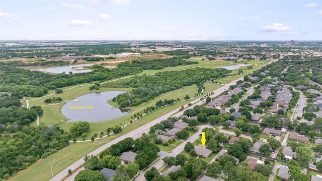 805 Sandpiper Dr, Denton, TX 76205 - aerial overview of property's location with a large body of water and nearby suburban area
