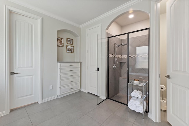14322 Summerwoods Ln, Frisco, TX 75035 - full bathroom featuring a shower stall, tile patterned floors, crown molding, and baseboards