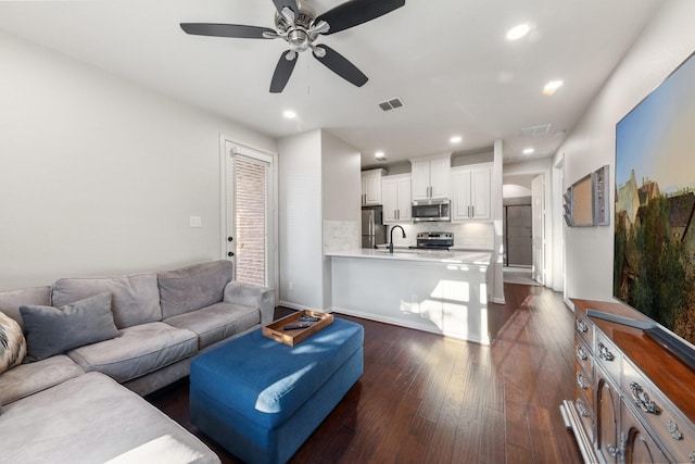 14322 Summerwoods Ln, Frisco, TX 75035 - living area featuring a ceiling fan, recessed lighting, and dark wood-style floors