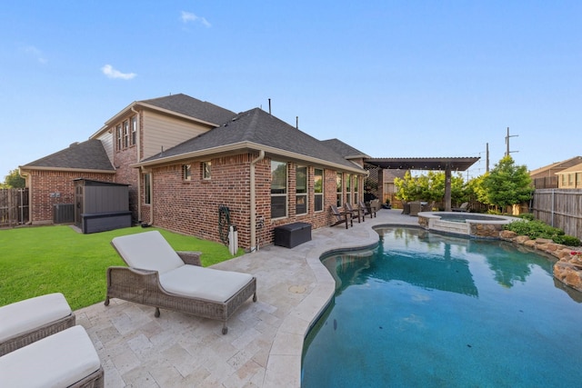 14322 Summerwoods Ln, Frisco, TX 75035 - view of swimming pool featuring a patio area, a pool with connected hot tub, and central AC