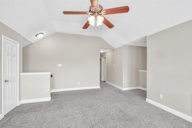 207 Trailwood Dr, Allen, TX 75002 - bonus room featuring ceiling fan, carpet flooring, lofted ceiling, and baseboards