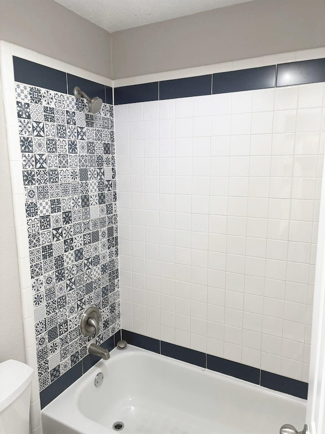 207 Trailwood Dr, Allen, TX 75002 - bathroom featuring toilet and bathtub / shower combination