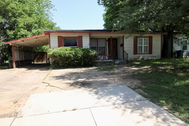 6645 Onyx Dr N, North Richland Hills, TX 76180 - view of front of property with decorative driveway and an attached carport