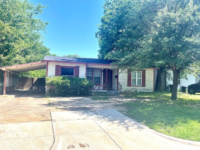 6645 Onyx Dr N, North Richland Hills, TX 76180 - view of front of home with concrete driveway and a carport