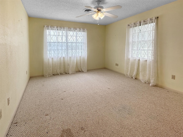 10550 Fm 215, Valley Mills, TX 76689 - empty room with a ceiling fan, carpet flooring, and a textured ceiling