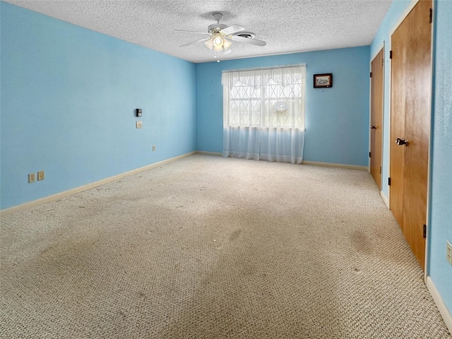 10550 Fm 215, Valley Mills, TX 76689 - carpeted empty room with ceiling fan, a textured ceiling, and baseboards