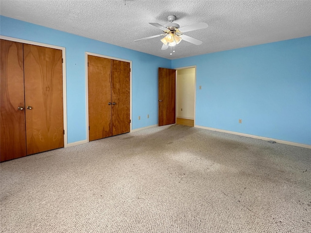 10550 Fm 215, Valley Mills, TX 76689 - unfurnished bedroom with baseboards, a textured ceiling, carpet floors, and a ceiling fan