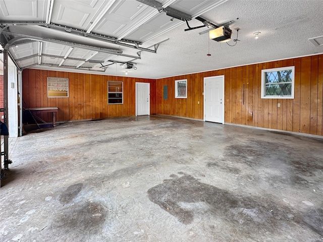 10550 Fm 215, Valley Mills, TX 76689 - garage with wooden walls and a garage door opener