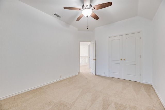 2904 Champlin Ct, Richardson, TX 75082 - unfurnished bedroom with light colored carpet, a closet, baseboards, ceiling fan, and vaulted ceiling