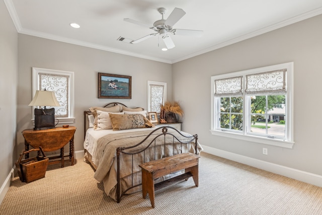 bedroom featuring baseboards, crown molding, light carpet, recessed lighting, and ceiling fan