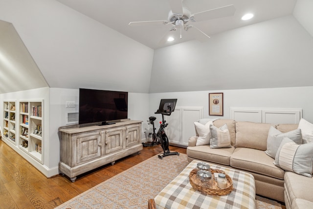 living area featuring lofted ceiling, wood finished floors, ceiling fan, and recessed lighting