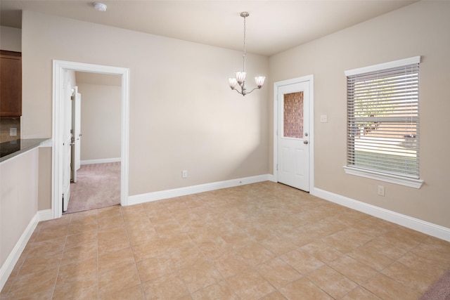 609 Racine Dr, Oak Point, TX 75068 - unfurnished dining area with a chandelier and baseboards
