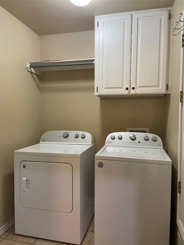 1102 N Main St, Leonard, TX 75452 - laundry room with washer and dryer and cabinet space