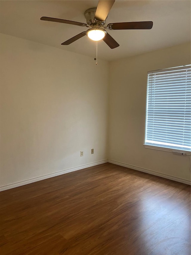 1102 N Main St, Leonard, TX 75452 - unfurnished room with wood finished floors, ceiling fan, and baseboards