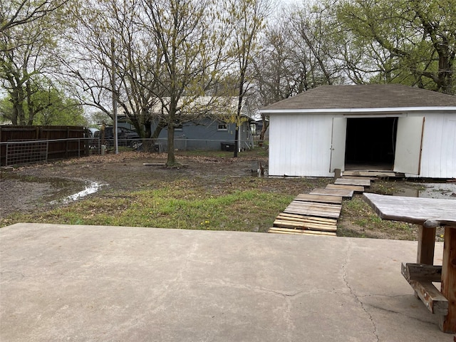 1102 N Main St, Leonard, TX 75452 - view of yard with a patio area, fence, a shed, and an outbuilding