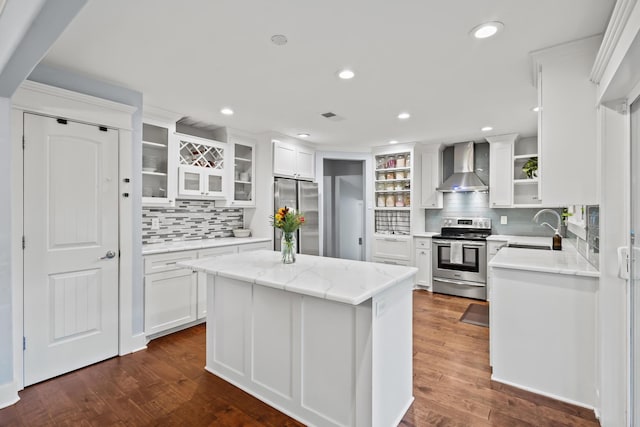 2306 Monte Cristo Dr, Sherman, TX 75092 - kitchen featuring stainless steel appliances, open shelves, wall chimney range hood, backsplash, and white cabinets