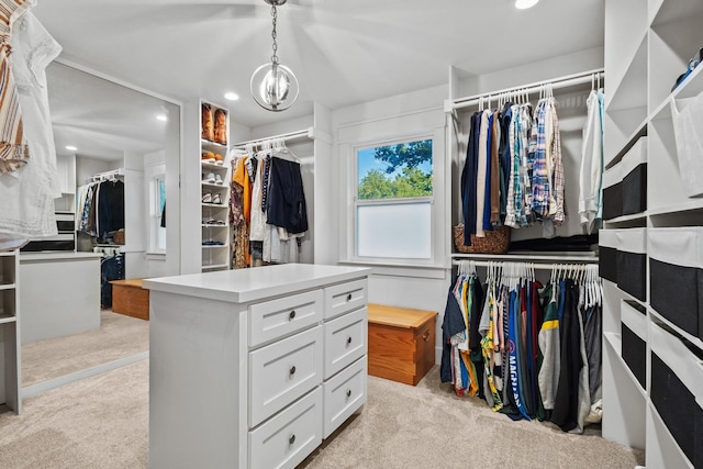 2306 Monte Cristo Dr, Sherman, TX 75092 - walk in closet with light carpet and a chandelier