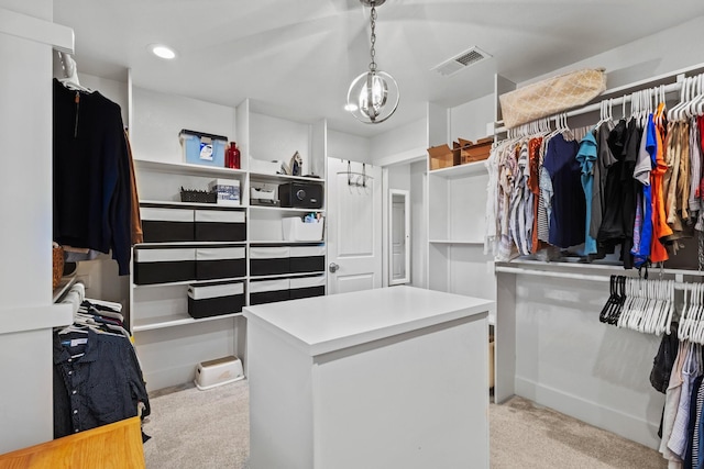 2306 Monte Cristo Dr, Sherman, TX 75092 - spacious closet with light colored carpet and a chandelier