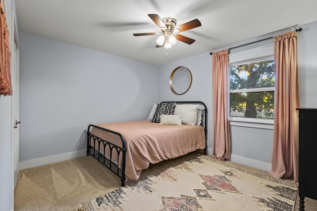 2306 Monte Cristo Dr, Sherman, TX 75092 - carpeted bedroom with baseboards and a ceiling fan