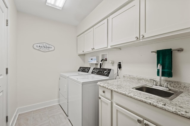 2306 Monte Cristo Dr, Sherman, TX 75092 - laundry area featuring independent washer and dryer, cabinet space, and baseboards