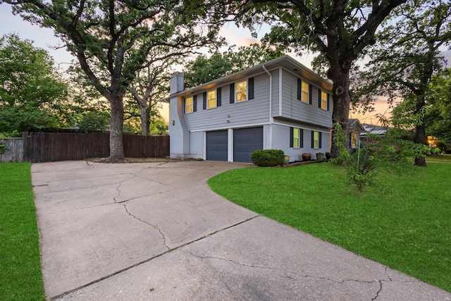 2306 Monte Cristo Dr, Sherman, TX 75092 - view of front of home with driveway, a chimney, and a garage