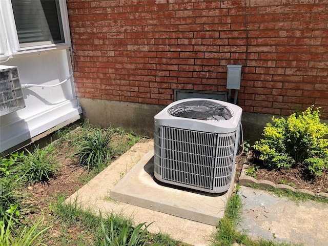 608 Spinner Rd, Desoto, TX 75115 - exterior view of brick siding and cooling unit