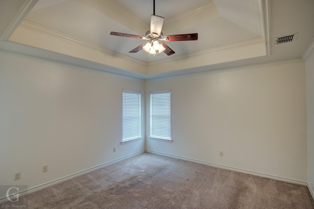 122 Lola Cir, Benton, LA 71006 - carpeted spare room featuring a tray ceiling, crown molding, a ceiling fan, and baseboards
