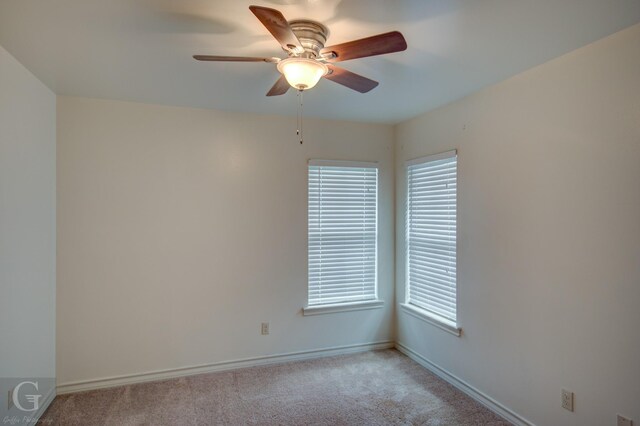 122 Lola Cir, Benton, LA 71006 - unfurnished room featuring light carpet, a ceiling fan, and baseboards