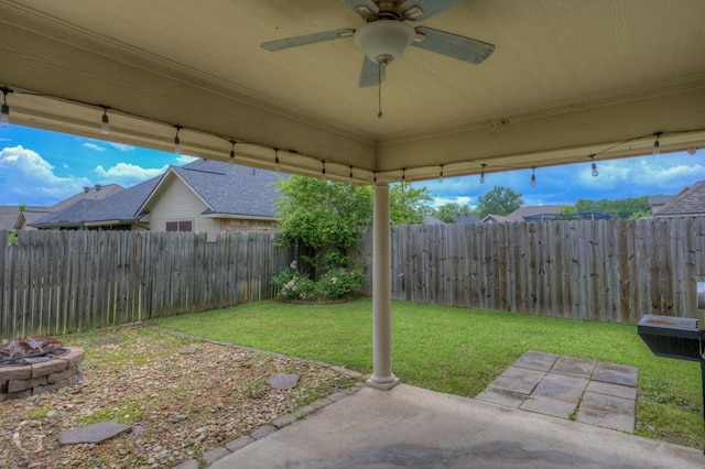 122 Lola Cir, Benton, LA 71006 - view of yard featuring a fire pit, a patio area, and a ceiling fan