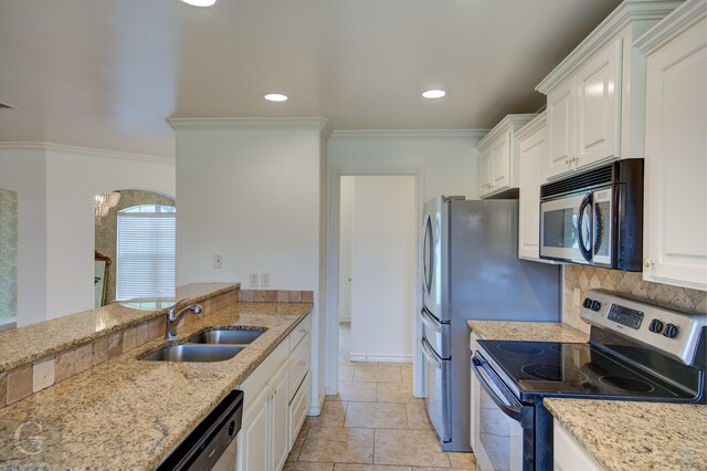 122 Lola Cir, Benton, LA 71006 - kitchen with stainless steel appliances, a sink, white cabinetry, light stone countertops, and crown molding