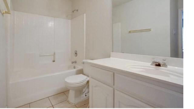 3233 S Univer Dr, Fort Worth, TX 76109 - full bathroom featuring toilet, tile patterned flooring, shower / tub combination, and vanity