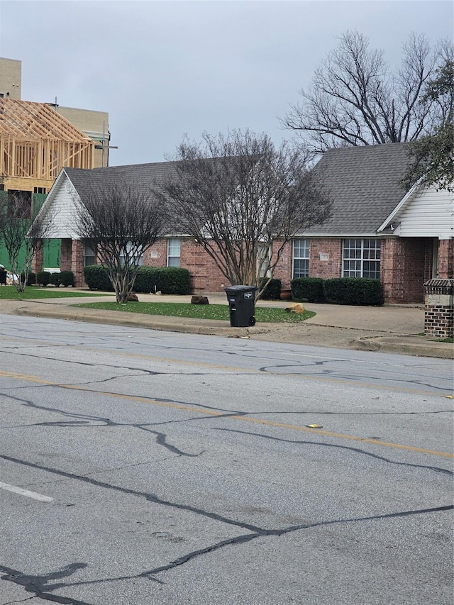 3233 S Univer Dr, Fort Worth, TX 76109 - view of asphalt street featuring sidewalks and curbs