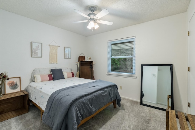 2012 S Meadow Way Cir, Arlington, TX 76015 - carpeted bedroom with a textured ceiling, ceiling fan, and baseboards
