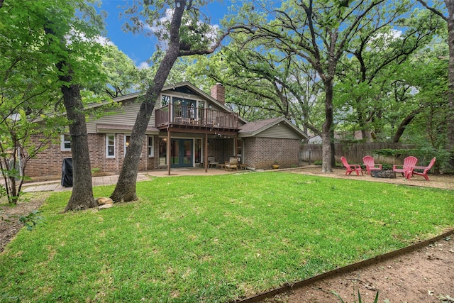 2012 S Meadow Way Cir, Arlington, TX 76015 - back of property with an outdoor fire pit, french doors, brick siding, a patio, and a chimney