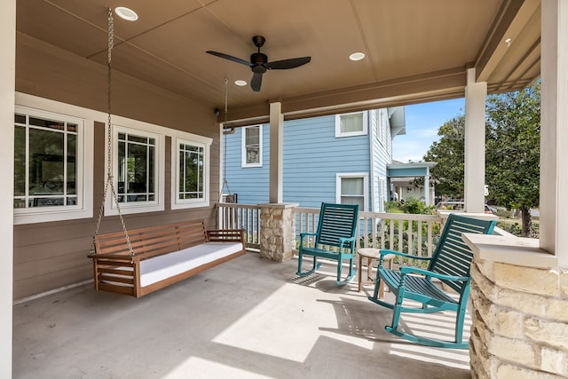 view of patio with a porch and a ceiling fan