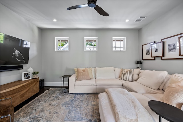living room featuring recessed lighting, wood finished floors, a ceiling fan, and baseboards