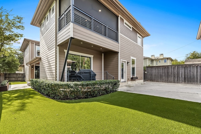 rear view of house featuring a patio area