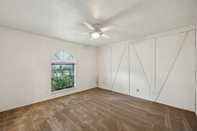 2302 Denmark Dr, Garland, TX 75040 - carpeted empty room with ceiling fan