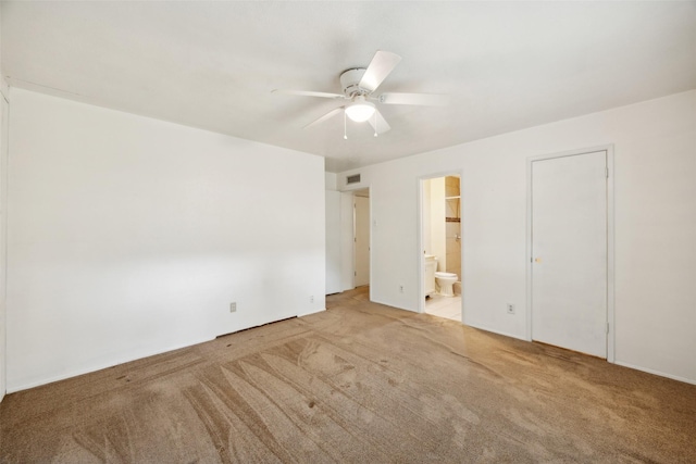 2302 Denmark Dr, Garland, TX 75040 - unfurnished bedroom with carpet flooring, ensuite bathroom, and a ceiling fan