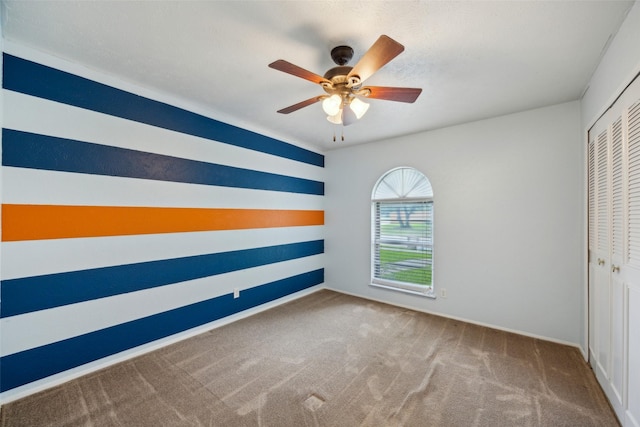 2302 Denmark Dr, Garland, TX 75040 - unfurnished room with carpet, a ceiling fan, and baseboards