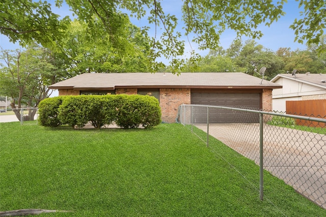 2302 Denmark Dr, Garland, TX 75040 - single story home with a garage, brick siding, and driveway