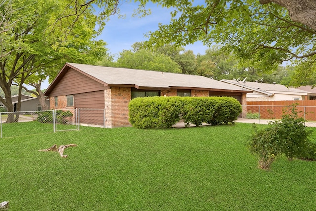 2302 Denmark Dr, Garland, TX 75040 - view of front facade with brick siding and a garage