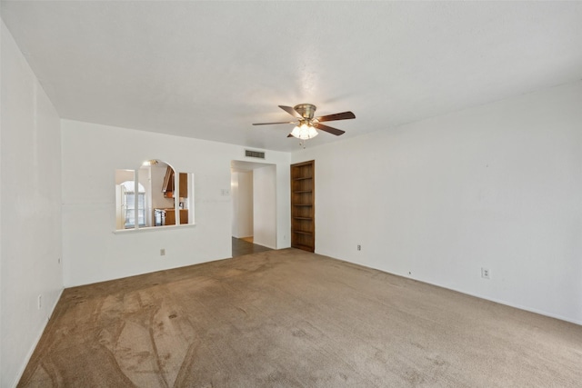 2302 Denmark Dr, Garland, TX 75040 - carpeted empty room with ceiling fan and built in features