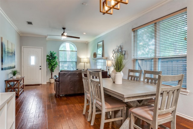 1219 Haines Ave, Dallas, TX 75208 - dining area with hardwood / wood-style flooring, ornamental molding, and ceiling fan
