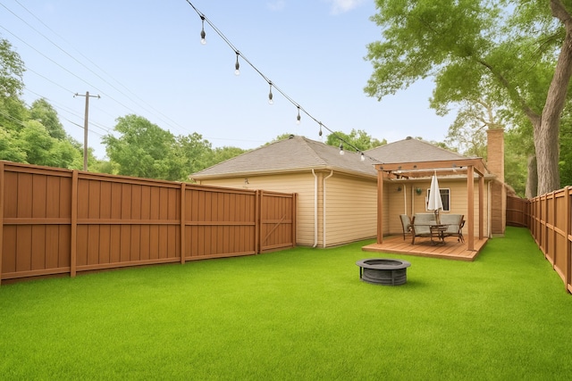 1219 Haines Ave, Dallas, TX 75208 - fenced backyard featuring an outdoor fire pit and a deck