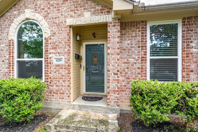 1219 Haines Ave, Dallas, TX 75208 - doorway to property featuring brick siding