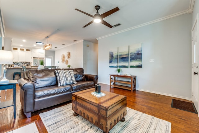 1219 Haines Ave, Dallas, TX 75208 - living room with ceiling fan, ornamental molding, wood finished floors, and recessed lighting