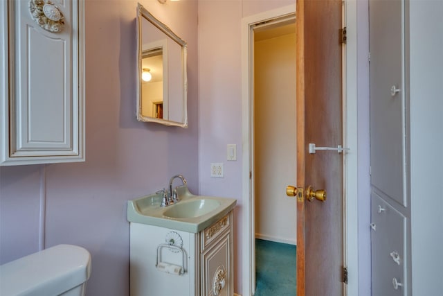 1406 E Cortez Dr, Wichita Falls, TX 76306 - half bathroom featuring toilet and vanity