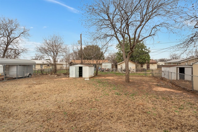 1406 E Cortez Dr, Wichita Falls, TX 76306 - fenced backyard with a storage shed and an outdoor structure